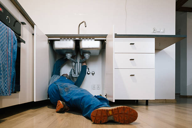 Professional Drain Cleaning technician working in Grasston, MN